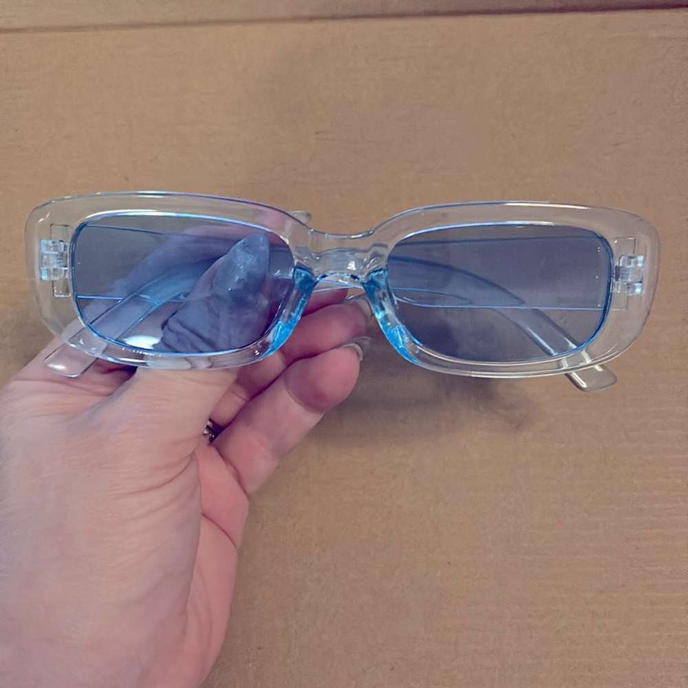 Baby blue translucent plastic rectangular glasses light blue lenses